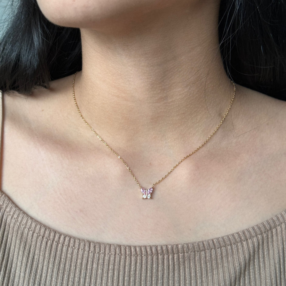 Collar mariposa rosa